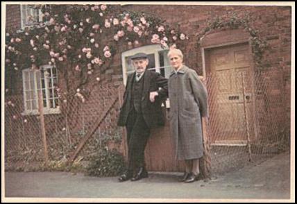 Tom Mason and Daisy Flavell standing outside his house on The Green.